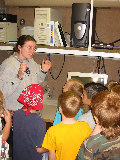 Balko Elementary visits S-Pol.  Crystalyne Pettet describes radar. (R.Rilling, 2002-May-16)