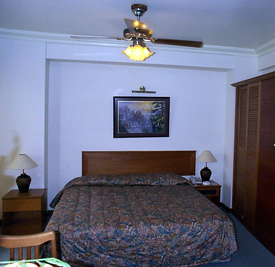 Relax Inn Hotel Bedroom