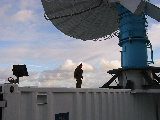 Al Phinney on roof of S-Pol, preparing for noise calibration. (R.Rilling, 03-Dec-2001)