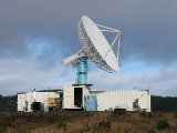 S-Pol radar in IMPROVEII, looking NNW.  Phinney in foreground. (R.Rilling, Nov-2001)