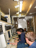 Joe VanAndel, Stacy Brodzik, Soccoro Medina and Jon Lutz work in the S-Pol Control Center, IMPROVE-II (R.Rilling, Nov-2001)