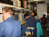 Joe VanAndel, Stacy Brodzik, Soccoro Medina and Jon Lutz work in the S-Pol Control Center, IMPROVE-II (R.Rilling, Dec-2001)