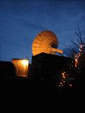 The radar at night.  Peggy Taylor's Christmas tree in foreground. (R.Rilling, Dec-2001)