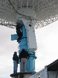 Jonathan Emmett gets training on how to level the S-Pol antenna.  Don Ferraro and Al Phinney provide guidance. (R.Rilling, 27-Nov-2001)