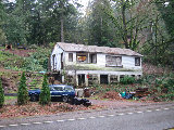 Moss-covered home near Holley, OR. (R.Rilling, 2001-Dec-04)